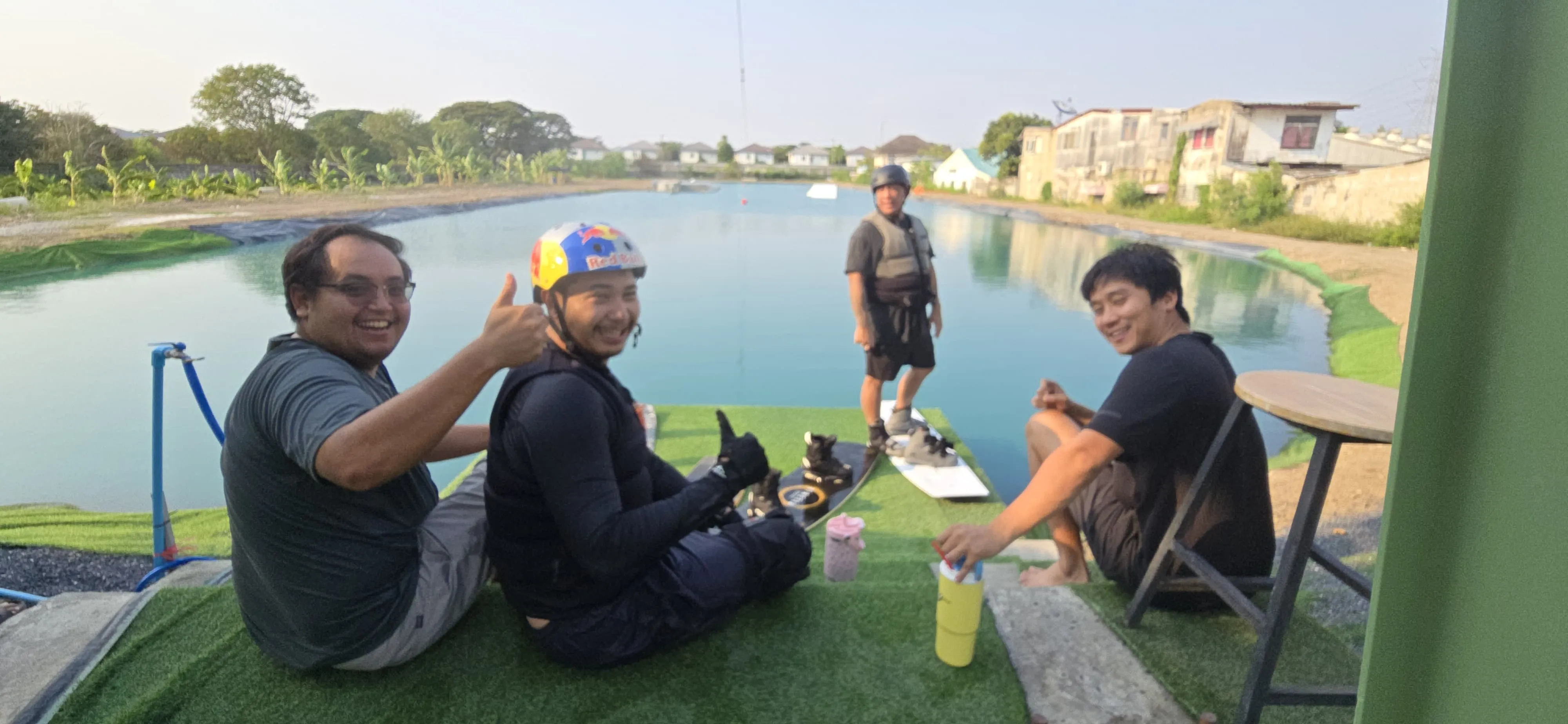 WakeGarden setting - straw huts and shaded seating